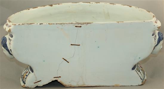 A Rouen faience pottery cistern, c.1720-1740, 53cm, restored